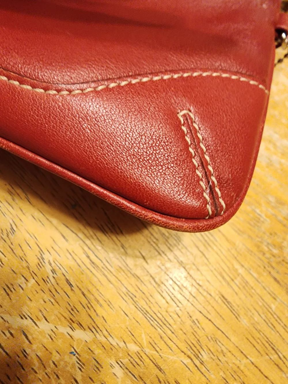 vintage Coach red leather Soho mini wristlet pouch featuring white contrast